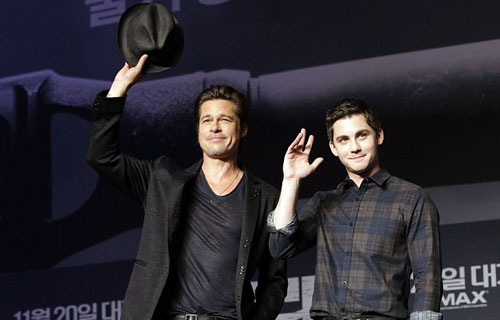 Brad Pitt wins waving his hat